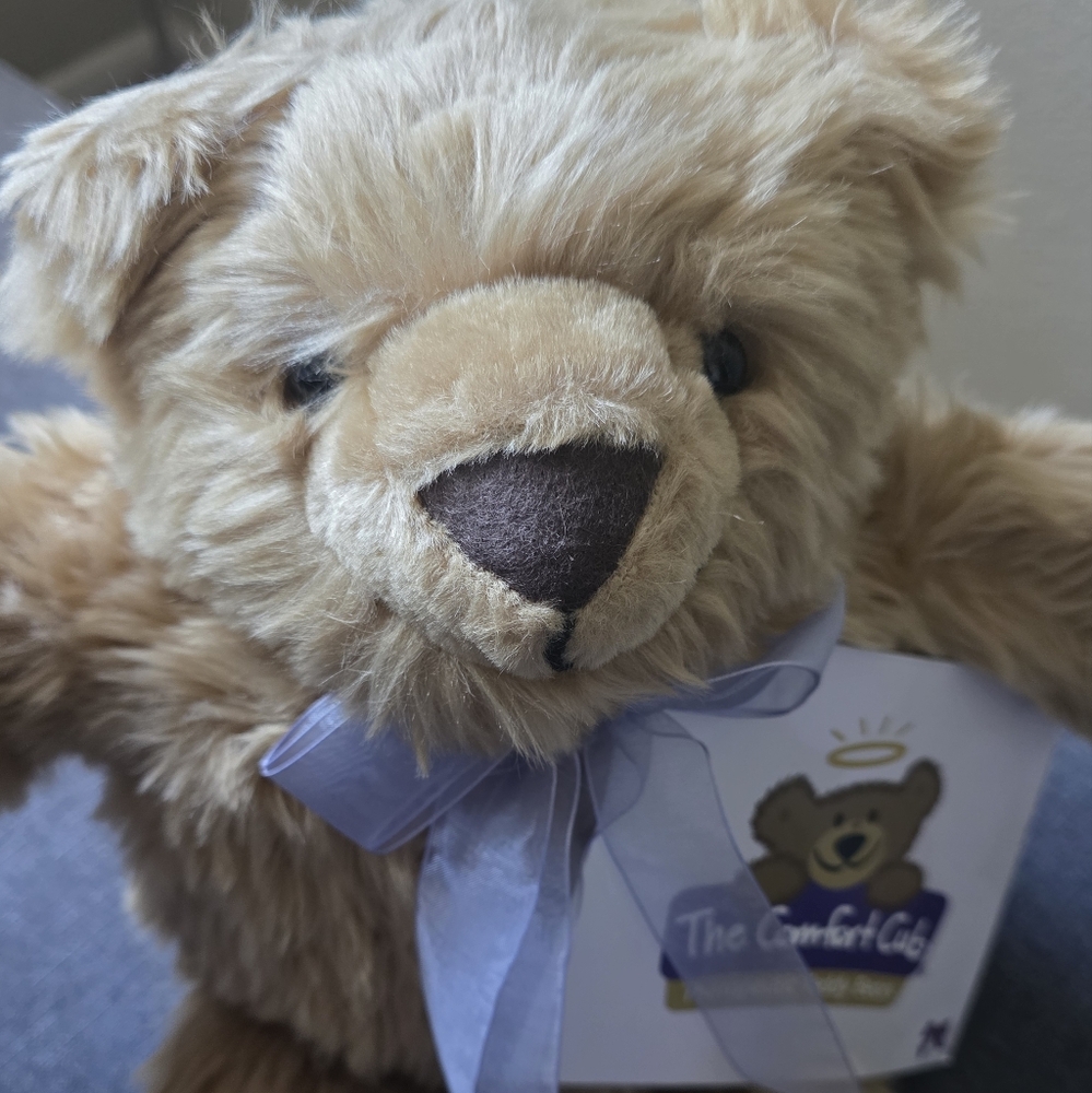 The Comfort Cub Plush Teddy Bear with Purple Ribbon